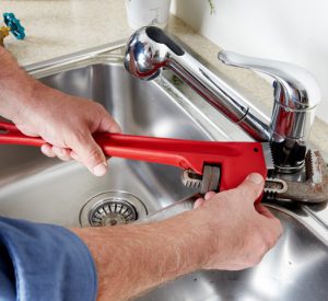 broken-faucet-fixed-by-a-professional-plumber-photo broken faucet fixed by a professional plumber photo