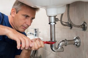 professional-plumber-working-photo professional plumber working photo