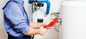 picture-of-a-plumber-repairing-water-heater Emergency Plumber in Lincoln, Nebraska