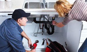plumber-giving-plumbing-repairs-to-a-broken-sink-drain Emergency Plumber in Corpus Christi, Texas