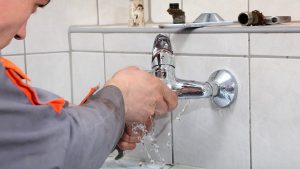 faucet-installing-plumber-photo Emergency Plumber - Water Line Service Near Me