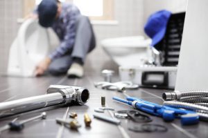 plumber-with-tools-photo-1 emergency plumber Long Island