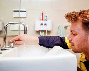 water-drop-check-at-lavatory-photo Cheyenne plumber near me